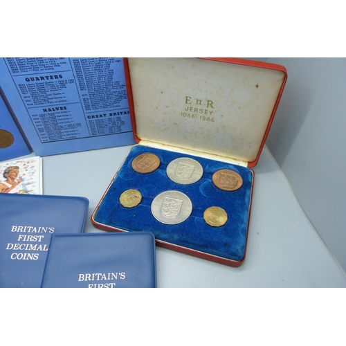 652 - A collection of coins including Great Britain half pennies set, Jersey 1066-1966, 1994, UK £2 coin, ... 