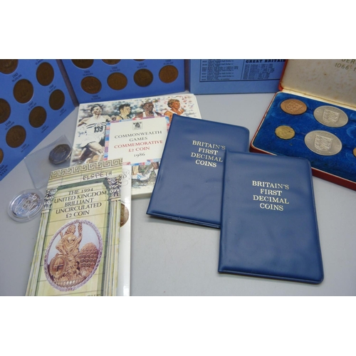 652 - A collection of coins including Great Britain half pennies set, Jersey 1066-1966, 1994, UK £2 coin, ... 