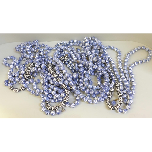 672 - Twenty vintage style porcelain bead necklaces including Chinese blue and white