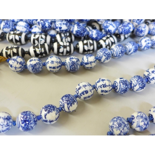 672 - Twenty vintage style porcelain bead necklaces including Chinese blue and white