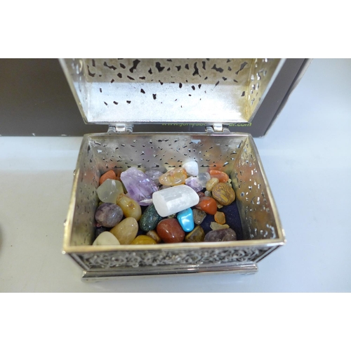 690 - A silver plated box containing cuff links, studs, plus letter openers and trinket pots, etc.