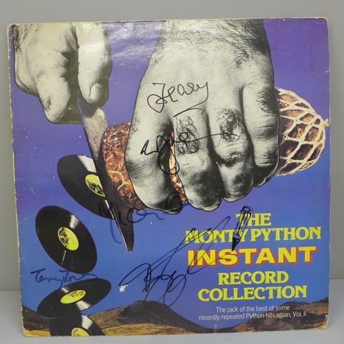 705 - A Monty Python LP record signed by John Cleese, Eric Idle, Terry Jones, Terry Gilliam and Michael Pa... 