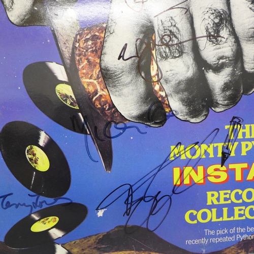 705 - A Monty Python LP record signed by John Cleese, Eric Idle, Terry Jones, Terry Gilliam and Michael Pa... 