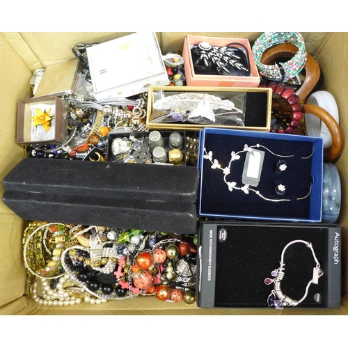 749 - A large box of costume jewellery