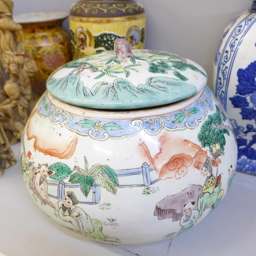 751 - Chinese ceramics and two resin figures, includes a large lidded pot decorated with Chinese figures