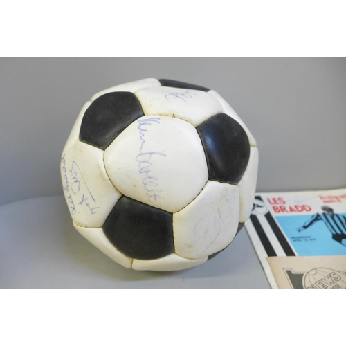 760 - Football memorabilia; a Notts County signed football from Les Bradd Testimonial and accompanying pro... 