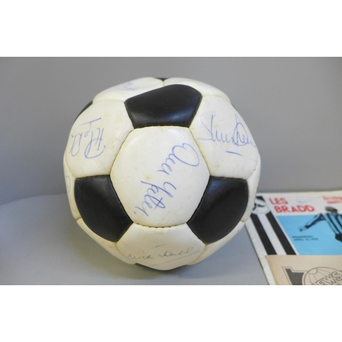 760 - Football memorabilia; a Notts County signed football from Les Bradd Testimonial and accompanying pro... 