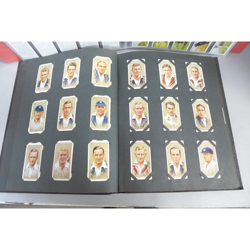 785 - Two cigarette card albums containing cards relating to footballers, birds, Grand National horses, av... 