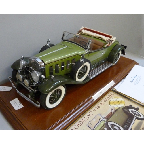 791 - A Danbury Mint 1:12 scale 1930 Cadillac V-16 Roadster on a wooden plinth, with brochure and certific... 