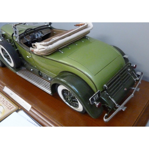 791 - A Danbury Mint 1:12 scale 1930 Cadillac V-16 Roadster on a wooden plinth, with brochure and certific... 