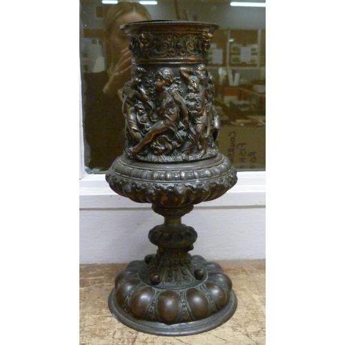 807 - A 19th Century gilt bronze urn, 30cm