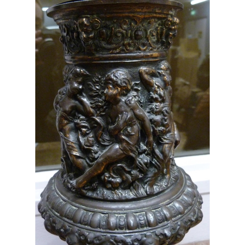 807 - A 19th Century gilt bronze urn, 30cm