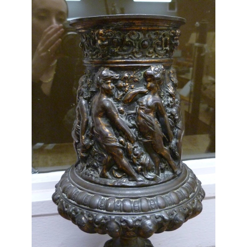 807 - A 19th Century gilt bronze urn, 30cm