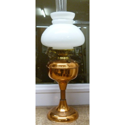 809 - An oil lamp with copper base