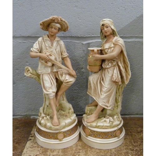 822 - A pair of continental figures, Royal Dux style, 28cm