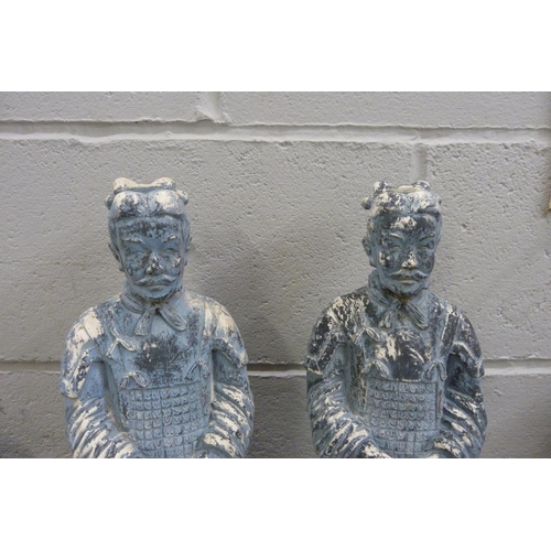 825 - A pair of Chinese terracotta army garden ornaments