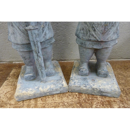 825 - A pair of Chinese terracotta army garden ornaments