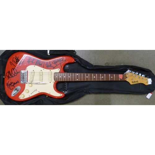 827 - A signed Rockwood by Hohner guitar by Def Leppard including Joe Elliott, Rick Allen and Rick Savage