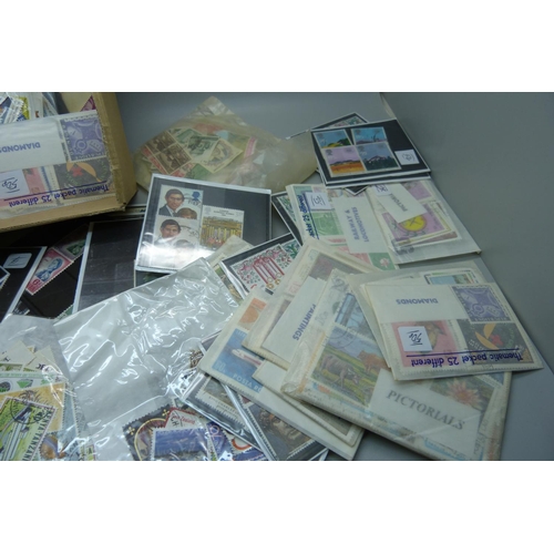 833 - Stamps; stamps in packets and on stockcards