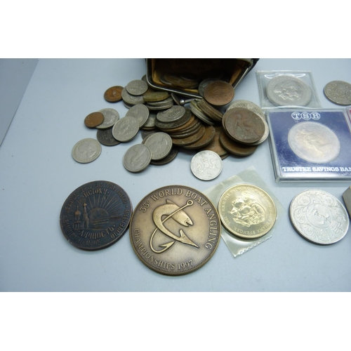 874 - A collection of coins, commemorative coins, medallions and a football fob medal