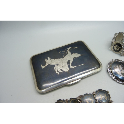 881 - A collection of Siam silver and niello jewellery and a cigarette case, total weight 253g, one bracel... 