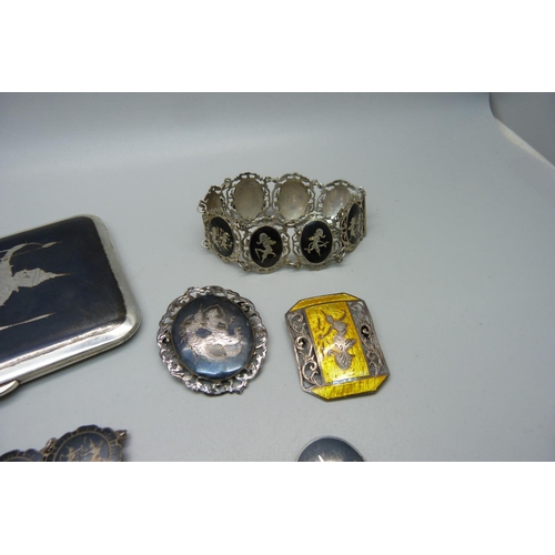 881 - A collection of Siam silver and niello jewellery and a cigarette case, total weight 253g, one bracel... 