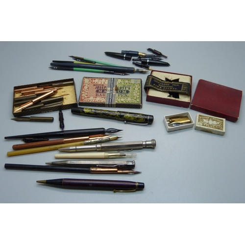 885 - A collection of pen, pencils, nibs, etc.