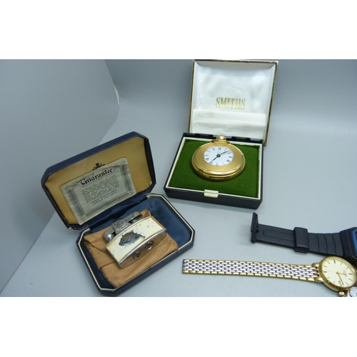 891 - A collection of wristwatches including a Smiths De Luxe, a pocket watch, etc., and three lighters in... 