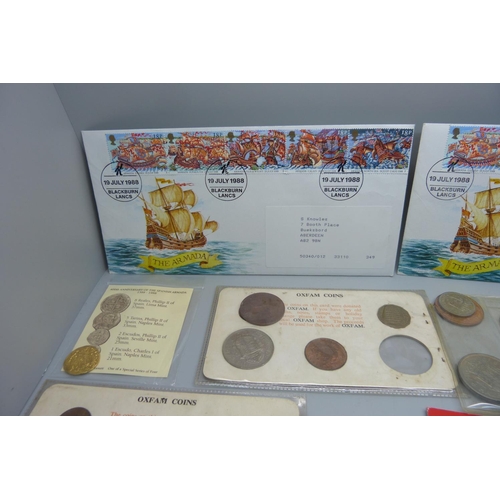 893 - A collection of coins and coin sets including two reproduction Armada coins, crowns, etc.