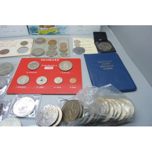 893 - A collection of coins and coin sets including two reproduction Armada coins, crowns, etc.