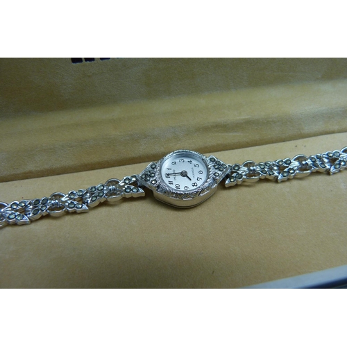 896 - Three silver rings and a lady's cocktail wristwatch