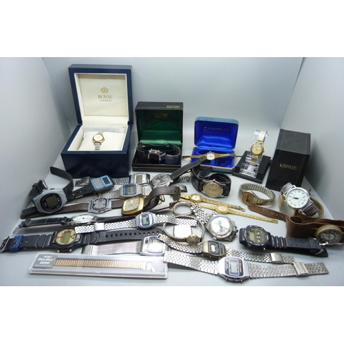 905 - A collection of lady's and gentleman's wristwatches, LCD, quartz and manual wind, also cases and bra... 