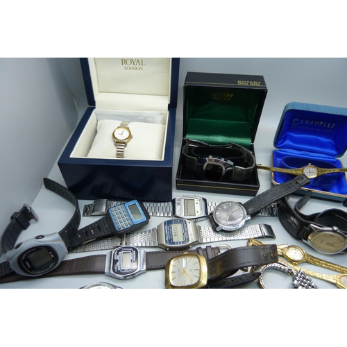 905 - A collection of lady's and gentleman's wristwatches, LCD, quartz and manual wind, also cases and bra... 