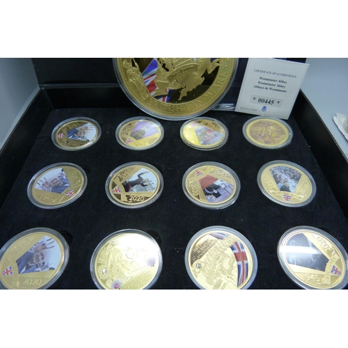 908 - A set of Victory 1945 anniversary commemorative coins, gold plated, Horatio Nelson coin, £5 bank not... 