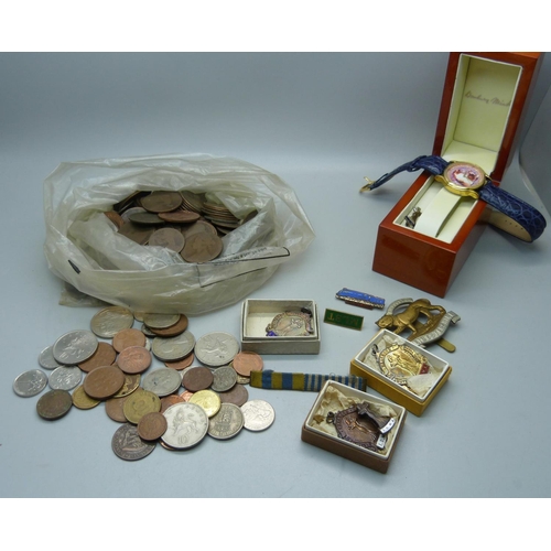 912 - British and foreign coins, two silver and other dancing medals and badges, a Leicestershire Regiment... 