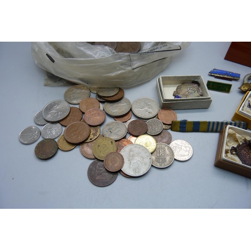 912 - British and foreign coins, two silver and other dancing medals and badges, a Leicestershire Regiment... 