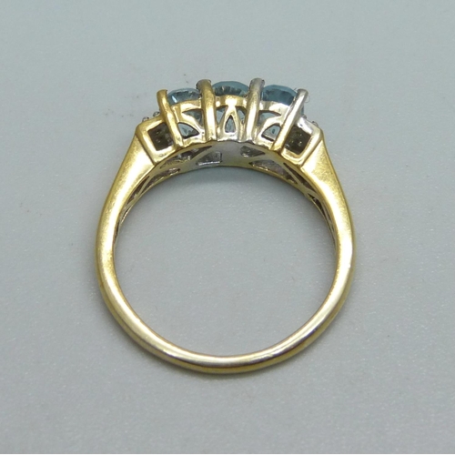 917 - A silver gilt, topaz and zircon ring, O/P