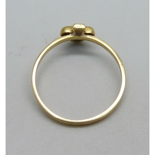 930 - A yellow metal and sapphire ring, 1.2g, K, tests as 18ct gold