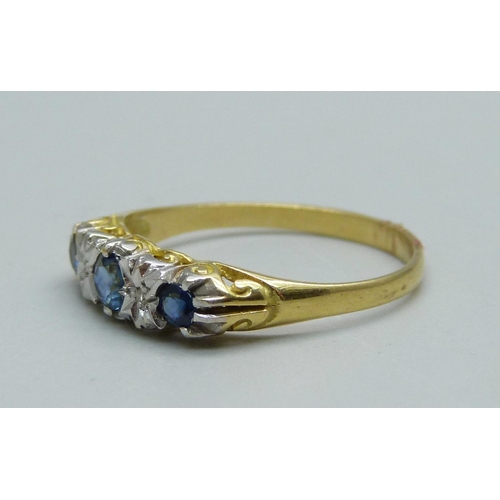 931 - An 18ct gold, diamond and sapphire ring, 2.9g, R