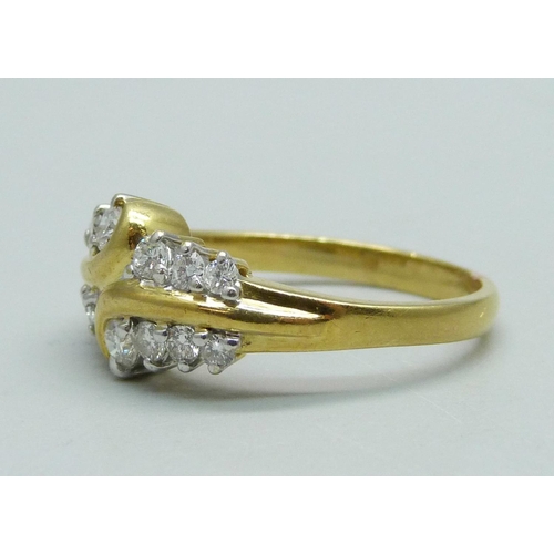 932 - An 18ct gold and diamond ring, 4.4g, P