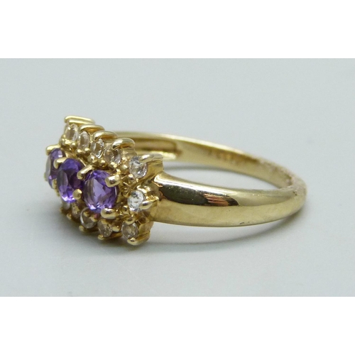 939 - A 9ct gold, white stone and amethyst ring, 2.7g, N/O