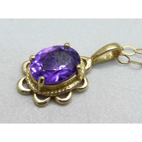 953 - A pair of yellow metal and amethyst earrings and a matching pendant on a fine 9ct gold chain, total ... 