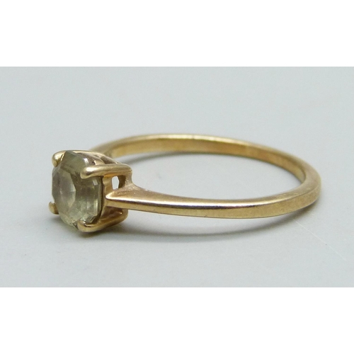 954 - A 9ct gold and csarite solitaire ring, 1.8g, O