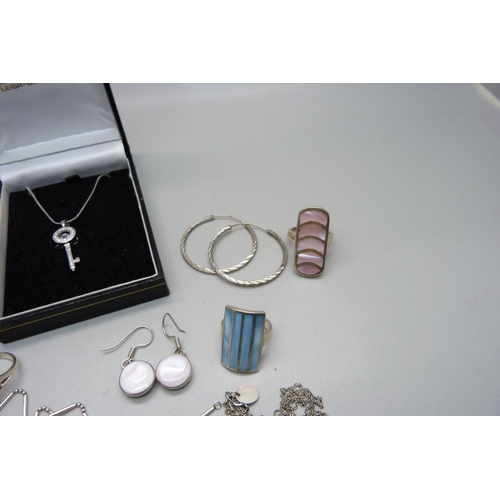 957 - Five pairs of silver earrings, three silver rings, two silver chains, one chain marked 10KGP, two pe... 