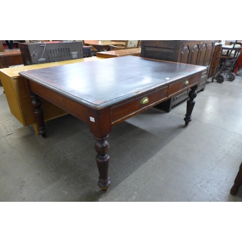 118 - A Victorian mahogany two drawer library table