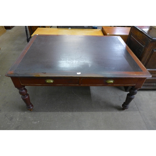 118 - A Victorian mahogany two drawer library table