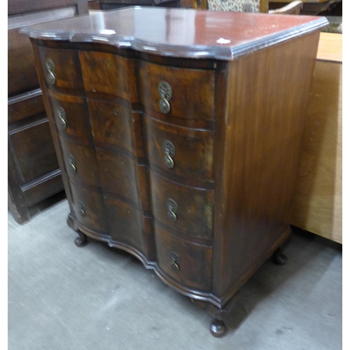 119 - A Queen Anne style mahogany and figured walnut chest of drawers