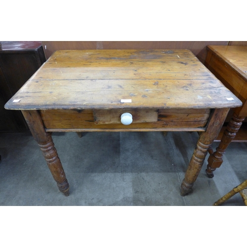 132 - A Victorian style pine single drawer kitchen table