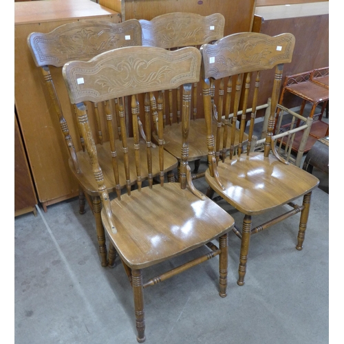 137 - A set of four American and beech dining chairs