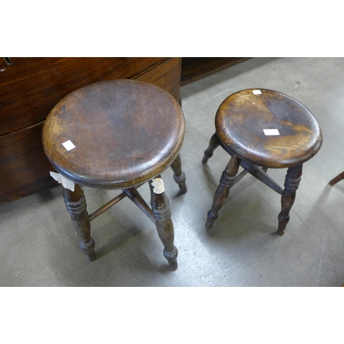 144 - Two Victorian elm and beech kitchen stools